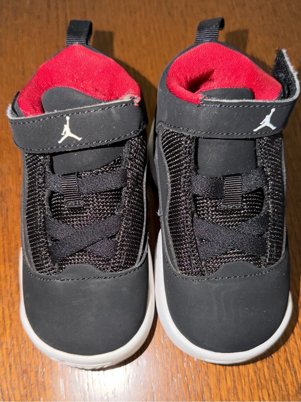 Jordan Kids Black Sneakers with Red Lining